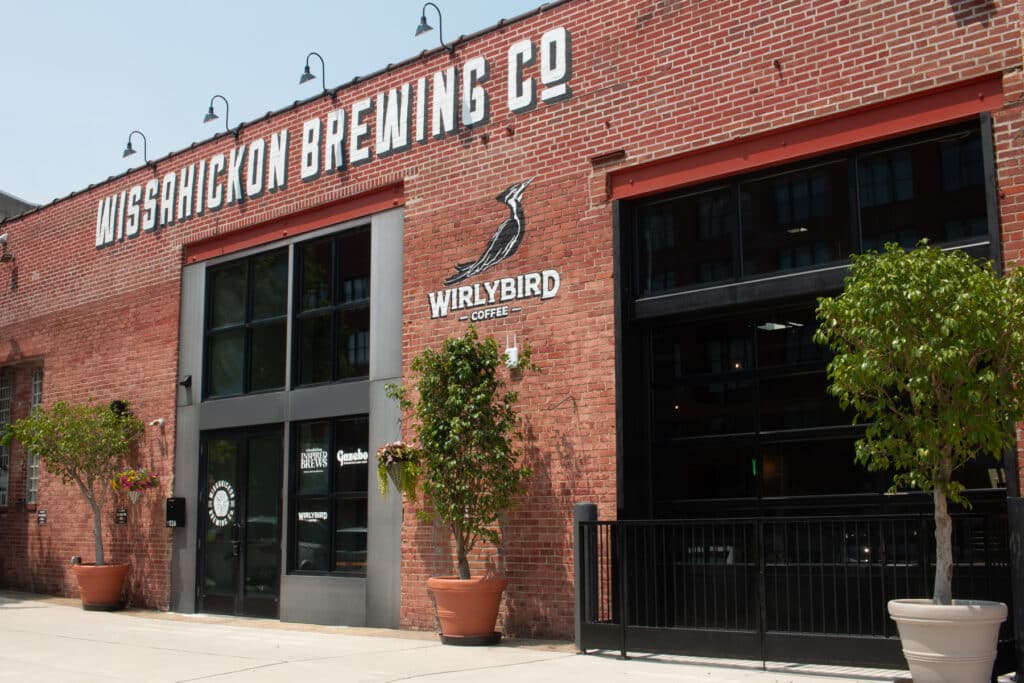 A photo shows an outdoor view of Wissahickon Brewing Company Olde Kensington. Wissahickon Brewing Company. Philadelphia-brewery-contact-us